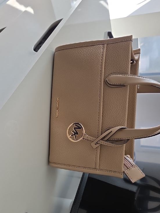 Michael Kors Handbags - Michael Kors Beige Leather Tote with Gold Logo Charm New New New
